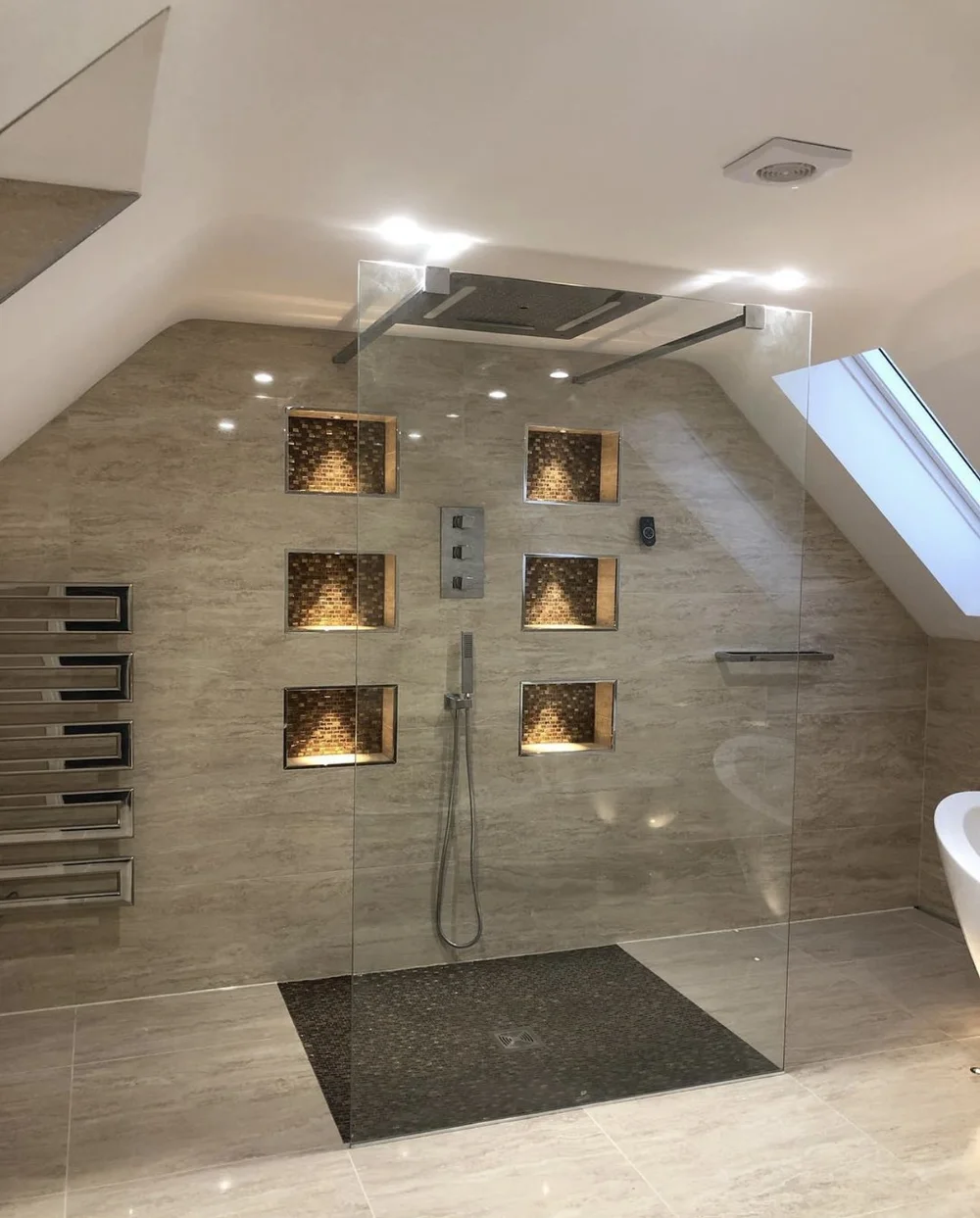 Luxury walk-in shower with illuminated mosaic niches installed in Farnborough